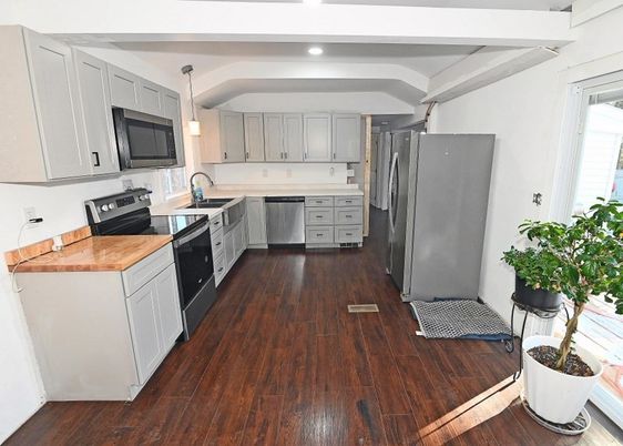 Interior, Kitchen, Pendant Lights, Recessed Lighting, Stainless Steel Appliances, Wood Texture Flooring