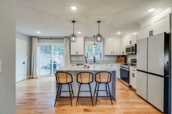 Interior, Kitchen, Pendant Lights, Recessed Lighting, Stainless Steel Appliances, Wood Texture Flooring