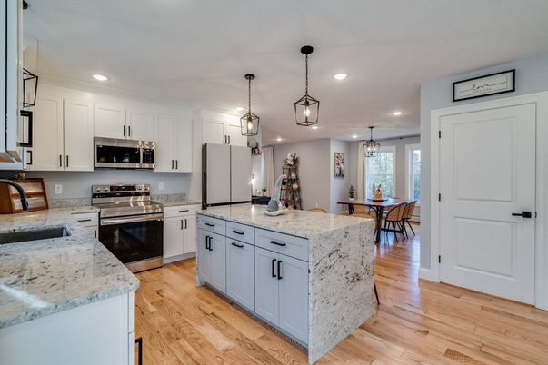 Chandelier, Dining room, Interior, Kitchen, Pendant Lights, Recessed Lighting, Stainless Steel Appliances, Wood Texture Flooring