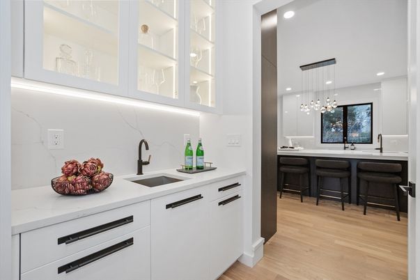 Interior, Kitchen, Marble Walls, Pendant Lights, Recessed Lighting, Wood Texture Flooring