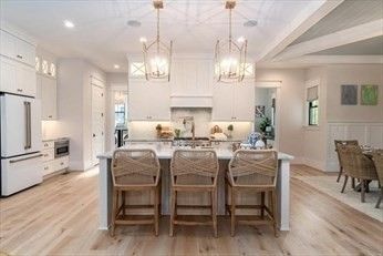 Chandelier, Dining room, Interior, Kitchen, Pendant Lights, Recessed Lighting, Stainless Steel Appliances, Wood Texture Flooring