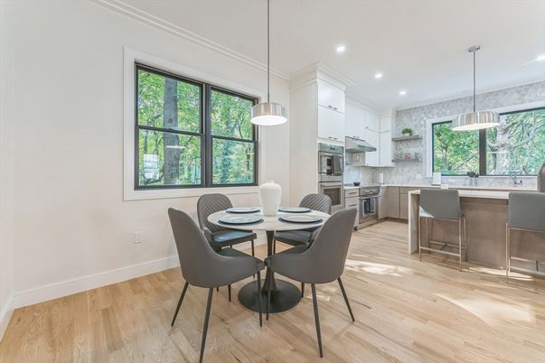 Dining room, Interior, Kitchen, Pendant Lights, Recessed Lighting, Stainless Steel Appliances, Wood Texture Flooring