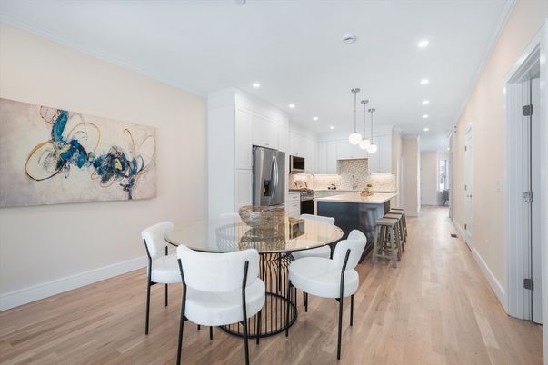 Dining room, Interior, Kitchen, Pendant Lights, Recessed Lighting, Stainless Steel Appliances, Wood Texture Flooring