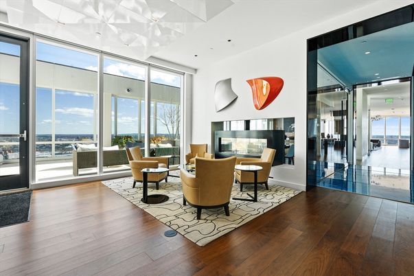 Dining room, Fireplace, Interior, Living room, Recessed Lighting, Water, Wood Texture Flooring