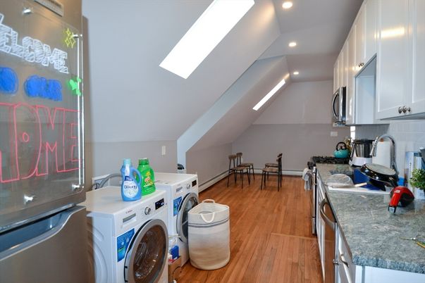 Interior, Kitchen, Recessed Lighting, Washer, Wood Texture Flooring