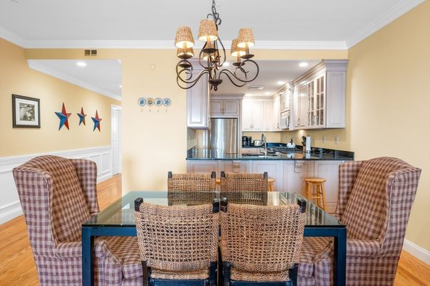 Chandelier, Dining room, Interior, Kitchen, Recessed Lighting, Stainless Steel Appliances, Wood Texture Flooring