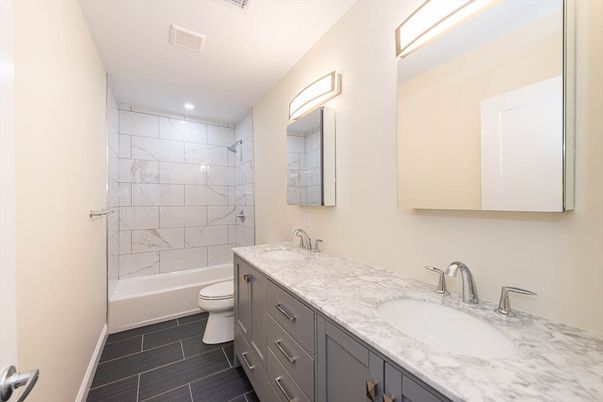 Bathroom, Dual Sink Vanities, Interior, Marble, Marble Walls, Recessed Lighting