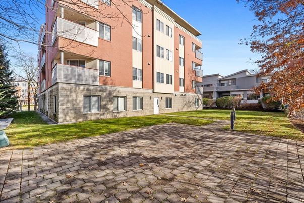 Backyard, Exterior, Facade, Brick Facade, Condo Building