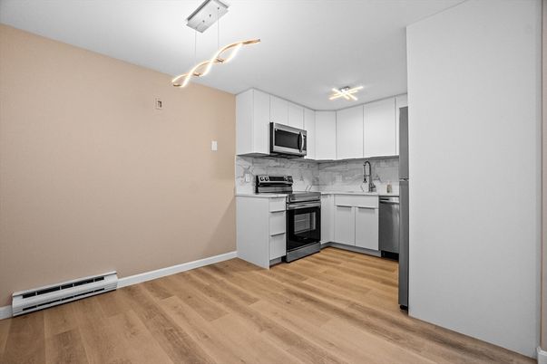 Interior, Kitchen, Marble Walls, Pendant Lights, Stainless Steel Appliances, Wood Texture Flooring