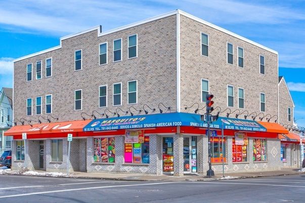 Exterior, Facade, Brick Facade, Condo Building