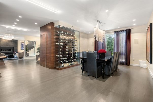 Chandelier, Dining room, Fireplace, Interior, Living room, Recessed Lighting, Wine Storage, Wood Texture Flooring