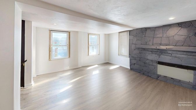 Empty room, Fireplace, Interior, Recessed Lighting, Stone Walls, Wood Texture Flooring