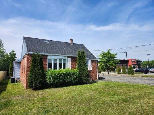 Exterior, Facade, Brick Facade, Cape Cod