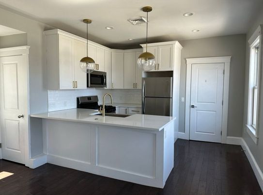 Interior, Kitchen, Pendant Lights, Recessed Lighting, Stainless Steel Appliances, Wood Texture Flooring