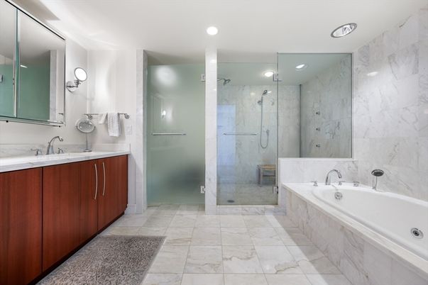 Bathroom, Dual Sink Vanities, Glass Shower, Interior, Marble, Marble Walls, Recessed Lighting
