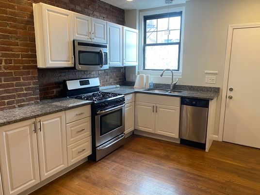 Interior, Kitchen, Pendant Lights, Recessed Lighting, Stainless Steel Appliances, Stone Walls, Wood Texture Flooring