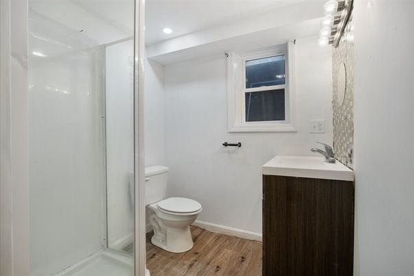 Bathroom, Glass Shower, Interior, Recessed Lighting, Wood Texture Flooring