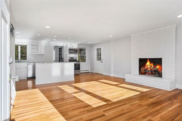 Fireplace, Interior, Kitchen, Recessed Lighting, Stainless Steel Appliances, Stone Walls, Wood Texture Flooring