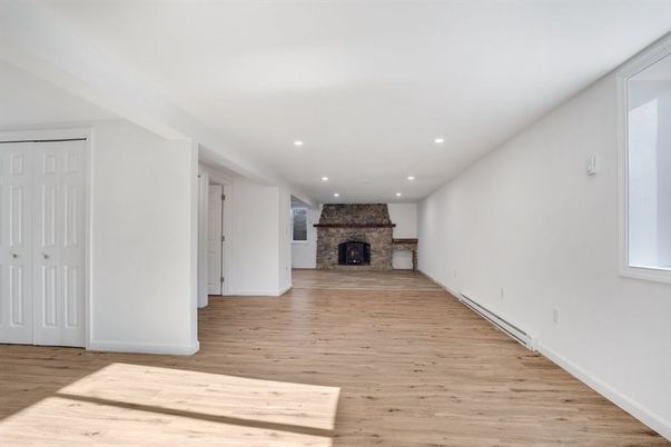 Empty room, Fireplace, Interior, Recessed Lighting, Wood Texture Flooring