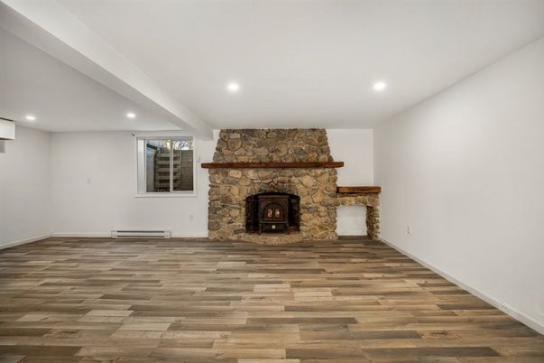 Empty room, Fireplace, Interior, Recessed Lighting, Wood Texture Flooring