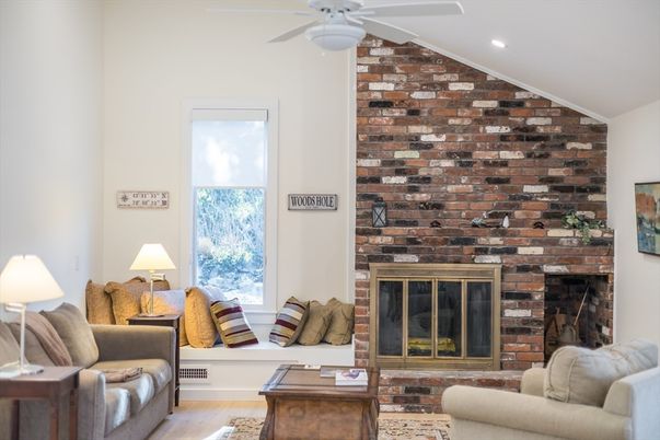 Fireplace, Interior, Living room, Recessed Lighting, Stone Walls, Wood Texture Flooring