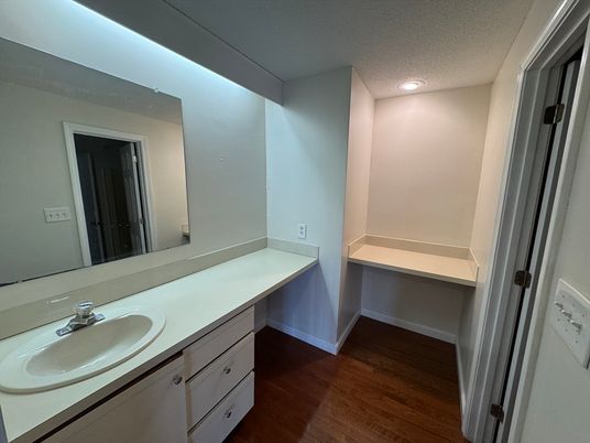 Bathroom, Dual Sink Vanities, Interior, Recessed Lighting, Wood Texture Flooring