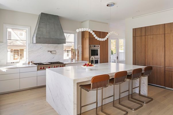 Interior, Kitchen, Marble Walls, Pendant Lights, Recessed Lighting, Stainless Steel Appliances, Wood Texture Flooring