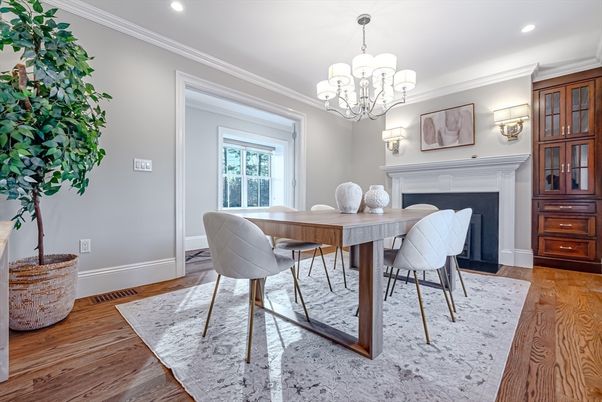 Chandelier, Dining room, Fireplace, Interior, Recessed Lighting, Wood Texture Flooring