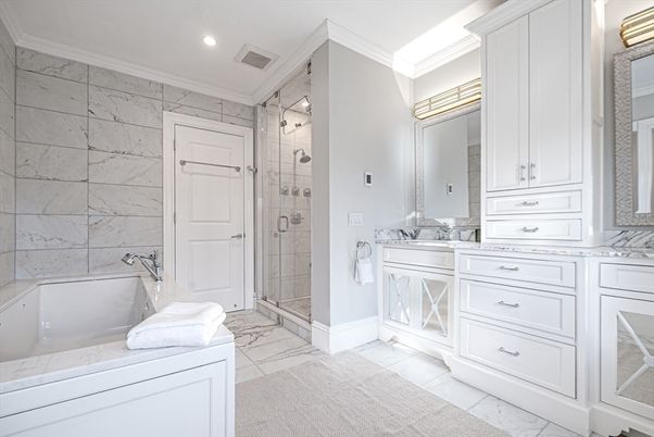 Bathroom, Dual Sink Vanities, Glass Shower, Interior, Marble, Marble Walls, Recessed Lighting