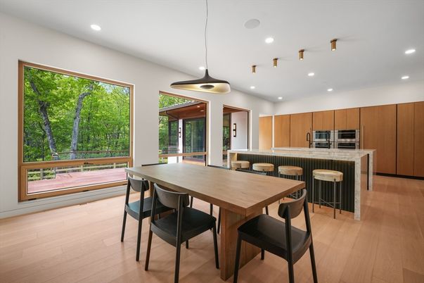 Dining room, Interior, Kitchen, Pendant Lights, Recessed Lighting, Stainless Steel Appliances, Wood Texture Flooring