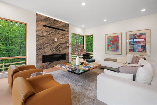 Fireplace, Interior, Living room, Marble Walls, Recessed Lighting, Wood Texture Flooring