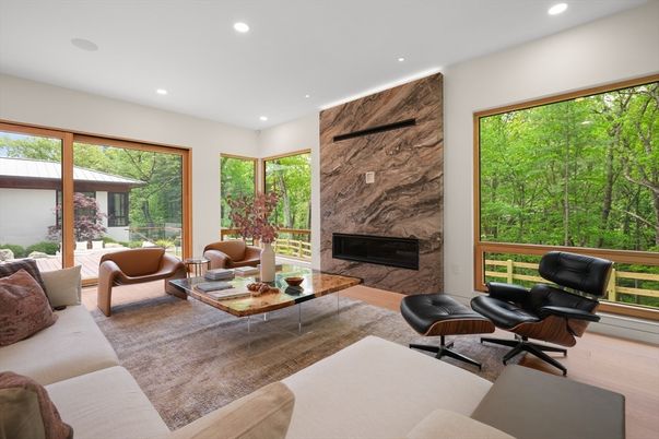 Fireplace, Interior, Living room, Marble Walls, Recessed Lighting, Wood Texture Flooring