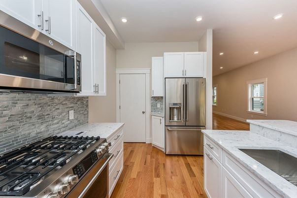 Interior, Kitchen, Recessed Lighting, Stainless Steel Appliances, Wood Texture Flooring