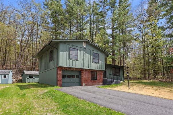 Attached, Backyard, Exterior, Facade, Brick Facade, Split Level