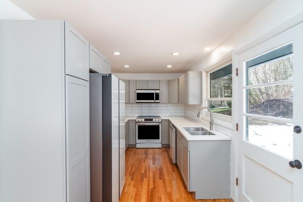 Interior, Kitchen, Recessed Lighting, Stainless Steel Appliances, Wood Texture Flooring