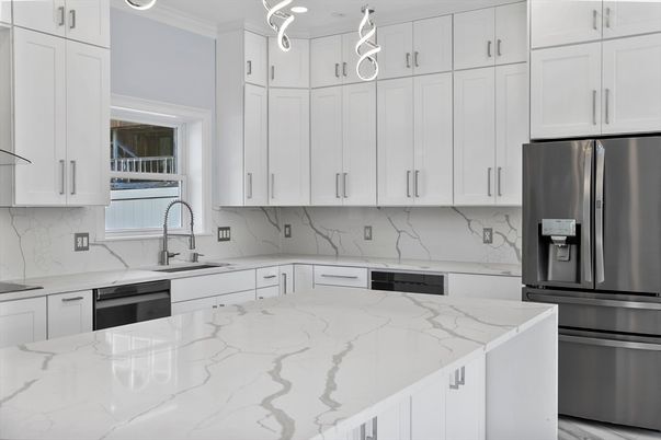 Interior, Kitchen, Marble Walls, Pendant Lights, Recessed Lighting, Stainless Steel Appliances