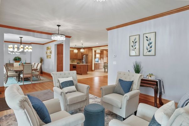 Chandelier, Dining room, Interior, Kitchen, Living room, Pendant Lights, Recessed Lighting, Stainless Steel Appliances, Wood Texture Flooring