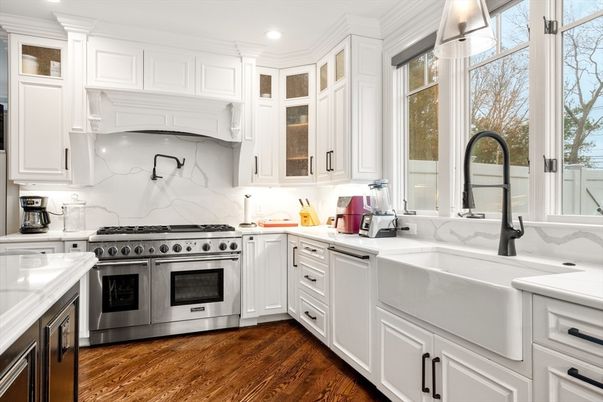 Interior, Kitchen, Marble Walls, Recessed Lighting, Stainless Steel Appliances, Wood Texture Flooring