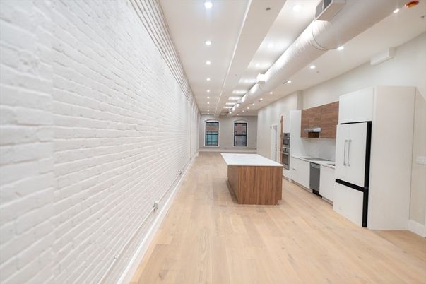 Interior, Kitchen, Recessed Lighting, Stainless Steel Appliances, Stone Walls, Wood Texture Flooring