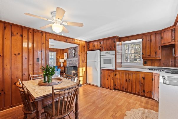 Dining room, Fireplace, Interior, Kitchen, Wood Texture Flooring, Wooden Walls