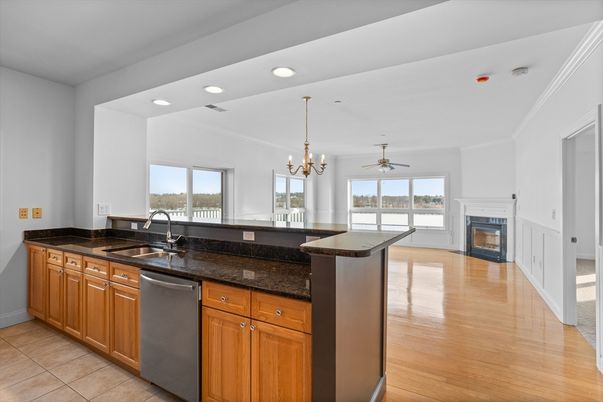 Chandelier, Fireplace, Interior, Kitchen, Recessed Lighting, Wood Texture Flooring
