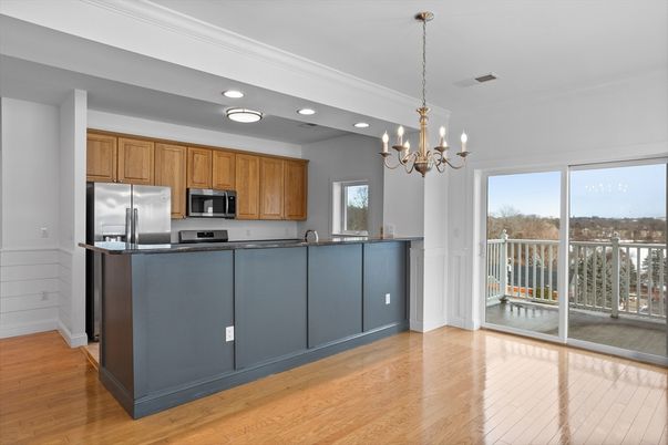 Chandelier, Interior, Kitchen, Recessed Lighting, Stainless Steel Appliances, Wood Texture Flooring
