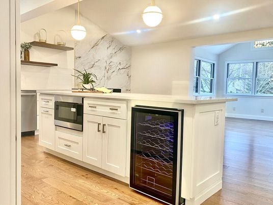 Interior, Kitchen, Marble Walls, Pendant Lights, Stainless Steel Appliances, Wood Texture Flooring