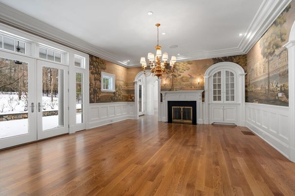 Chandelier, Empty room, Fireplace, Interior, Recessed Lighting, Wood Texture Flooring