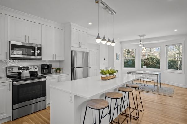 Dining room, Interior, Kitchen, Pendant Lights, Recessed Lighting, Stainless Steel Appliances, Wood Texture Flooring