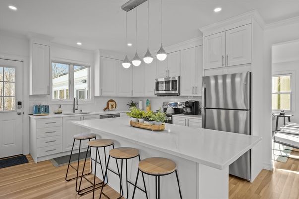Interior, Kitchen, Pendant Lights, Recessed Lighting, Stainless Steel Appliances, Wood Texture Flooring