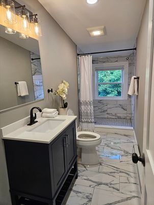 Bathroom, Dual Sink Vanities, Interior, Marble, Marble Walls, Recessed Lighting