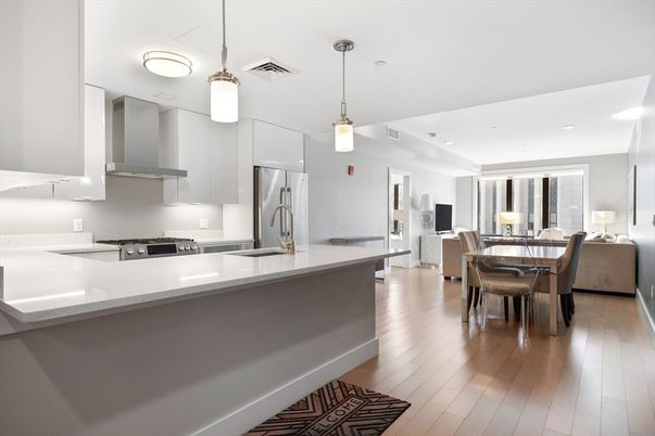 Dining room, Interior, Kitchen, Living room, Pendant Lights, Recessed Lighting, Stainless Steel Appliances, Wood Texture Flooring