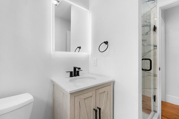 Bathroom, Glass Shower, Interior, Marble Walls, Wood Texture Flooring