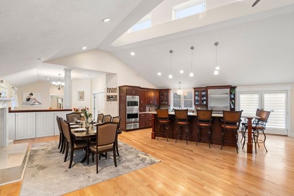 Chandelier, Dining room, Interior, Kitchen, Pendant Lights, Recessed Lighting, Stainless Steel Appliances, Wood Texture Flooring